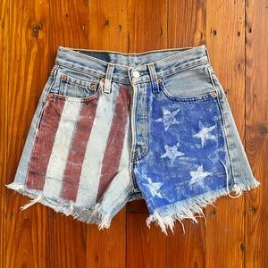 Vintage mid-90s Levi’s 501 American flag painted cut off jean shorts
